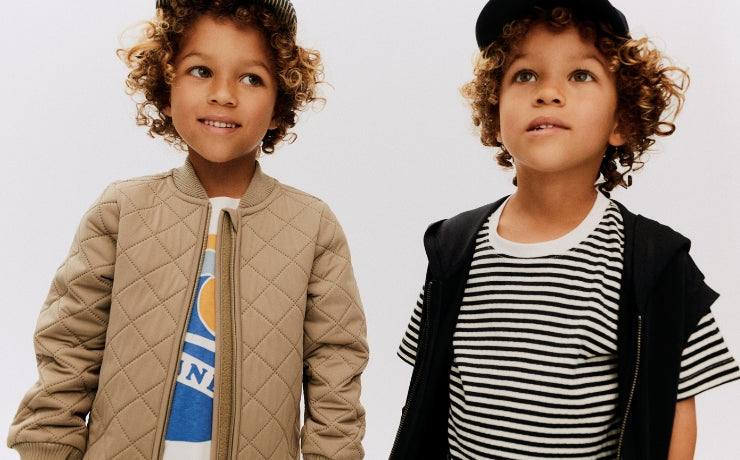 two boys wearing Wheat outerwear